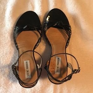 Steve Madden size 8 1/2 black wedge sandal. Worn once!
